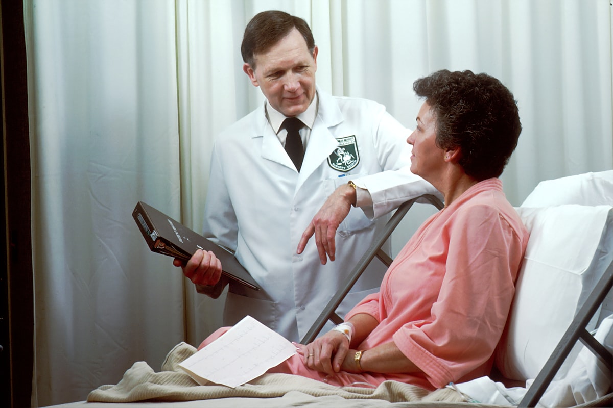 Physician reviewing treatment options